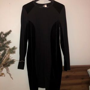 Black mid-length dress with velvet side detail
